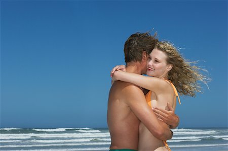 simsearch:600-00910372,k - Jeune Couple sur la plage Photographie de stock - Premium Libres de Droits, Code: 600-00824632