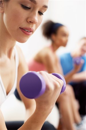 Woman Lifting Weight Stock Photo - Premium Royalty-Free, Code: 600-00824879