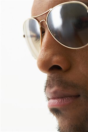 simsearch:600-00823179,k - Man Wearing Sunglasses Fotografie stock - Premium Royalty-Free, Codice: 600-00823156