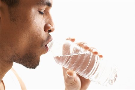 simsearch:600-00845951,k - Man Drinking Water Foto de stock - Sin royalties Premium, Código: 600-00823152