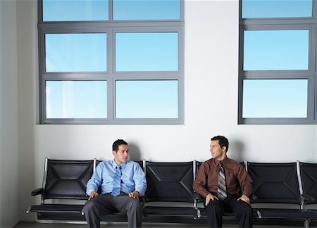 front row seat - Businessmen in Waiting Area Foto de stock - Sin royalties Premium, Código: 600-00823411