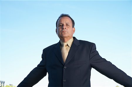 simsearch:600-00823439,k - Portrait of Businessman in City Stock Photo - Premium Royalty-Free, Code: 600-00823445