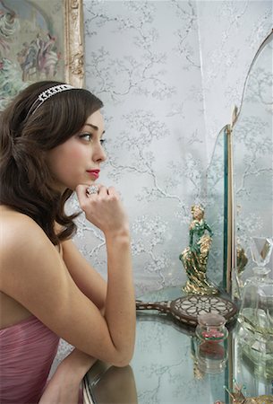 simsearch:600-00823754,k - Woman Looking in Mirror Stock Photo - Premium Royalty-Free, Code: 600-00823780