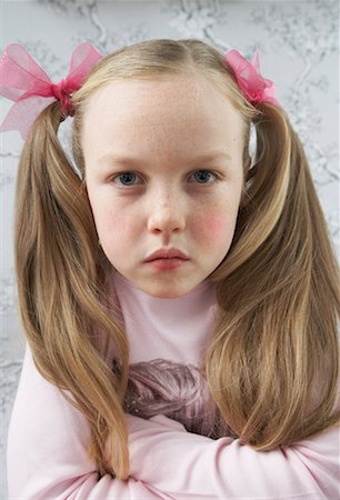 ribbon and pigtails - Portrait of Girl Stock Photo - Premium Royalty-Free, Code: 600-00823782