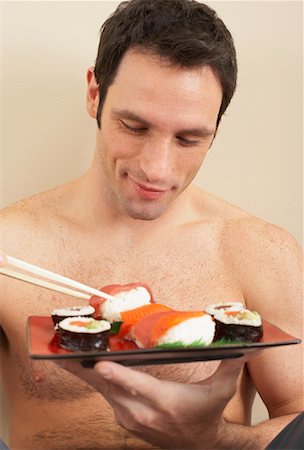 simsearch:600-00845951,k - Man Eating Sushi Foto de stock - Sin royalties Premium, Código: 600-00845967
