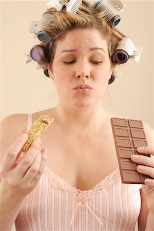 simsearch:600-00846027,k - Woman with Granola Bar and Chocolate Bar Stock Photo - Premium Royalty-Free, Code: 600-00846043