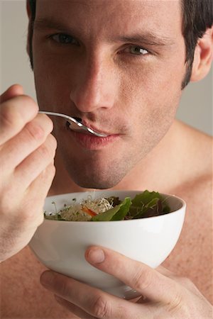 eat mouth closeup - Man Eating Salad Stock Photo - Premium Royalty-Free, Code: 600-00846076
