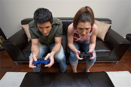 Couple Playing Video Game Stock Photo - Premium Royalty-Free, Code: 600-00846132