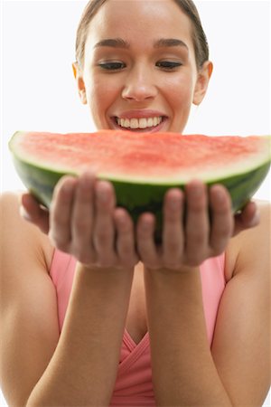 simsearch:600-02377500,k - Woman Holding Watermelon Foto de stock - Sin royalties Premium, Código: 600-00846414