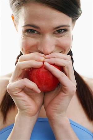 simsearch:600-02377500,k - Woman Eating Apple Foto de stock - Sin royalties Premium, Código: 600-00846413