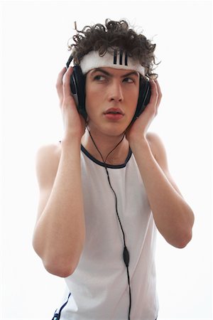 retro teenagers listening to music - Young Man Wearing Headphones Stock Photo - Premium Royalty-Free, Code: 600-00846565