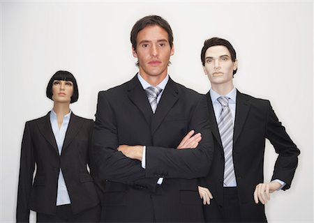 Businessman with Mannequins Stock Photo - Premium Royalty-Free, Code: 600-00846638