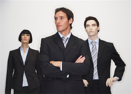 Businessman with Mannequins Stock Photo - Premium Royalty-Free, Code: 600-00846639