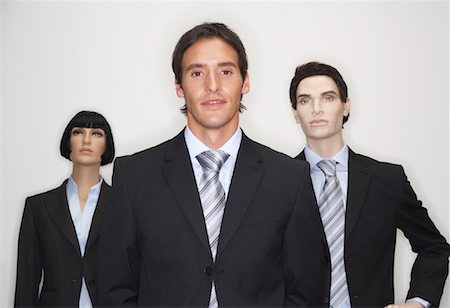 Businessman with Mannequins Stock Photo - Premium Royalty-Free, Code: 600-00846640