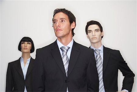 Businessman with Mannequins Stock Photo - Premium Royalty-Free, Code: 600-00846641