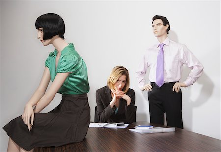 Businesswoman and Mannequins in Office Stock Photo - Premium Royalty-Free, Code: 600-00846671