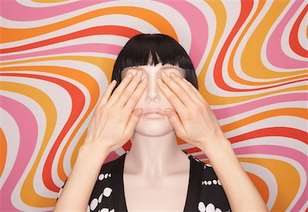 standing person covering eyes - Woman Covering Mannequin's Eyes Stock Photo - Premium Royalty-Free, Code: 600-00846682