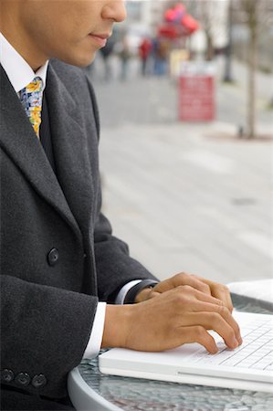 simsearch:600-07311112,k - Businessman Using Laptop Computer Stock Photo - Premium Royalty-Free, Code: 600-00846891