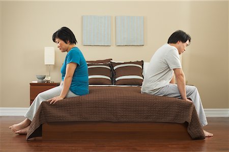 simsearch:400-03925541,k - Couple in Bedroom Stock Photo - Premium Royalty-Free, Code: 600-00846908