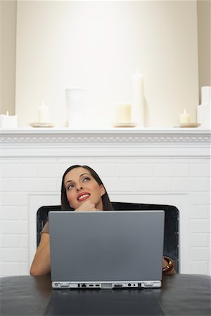 fireplace computer - Woman With Laptop Computer Stock Photo - Premium Royalty-Free, Code: 600-00847834