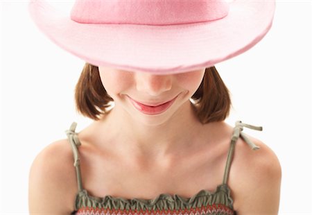 Girl in Pink Cowboy Hat Stock Photo - Premium Royalty-Free, Code: 600-00847946