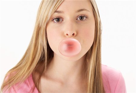 simsearch:600-01764926,k - Girl Chewing Bubblegum Foto de stock - Royalty Free Premium, Número: 600-00847966