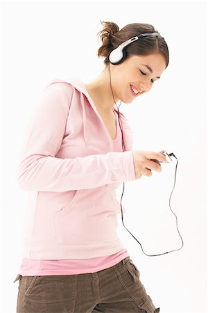 simsearch:600-00866282,k - Woman Listening to Headphones Stock Photo - Premium Royalty-Free, Code: 600-00847973