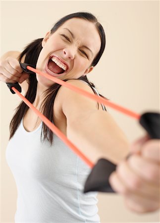 simsearch:600-00848083,k - Woman With Exercise Band Stock Photo - Premium Royalty-Free, Code: 600-00848079