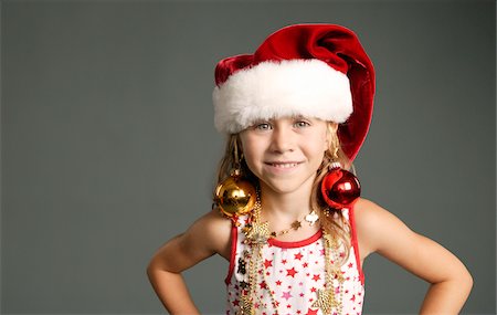 simsearch:600-01463921,k - Girl Wearing Christmas Decorations Stock Photo - Premium Royalty-Free, Code: 600-00864483