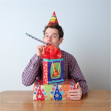 simsearch:693-07444529,k - Portrait of Man Celebrating His Birthday Stock Photo - Premium Royalty-Free, Code: 600-00865404