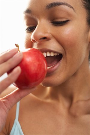 simsearch:600-00846410,k - Woman Eating Apple Foto de stock - Sin royalties Premium, Código: 600-00865971
