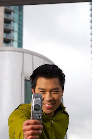 simsearch:600-01248055,k - Man Taking Photo with Camera Phone Stock Photo - Premium Royalty-Free, Code: 600-00865996