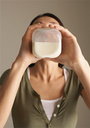 simsearch:600-00845951,k - Woman Drinking Milk Foto de stock - Sin royalties Premium, Código: 600-00866779