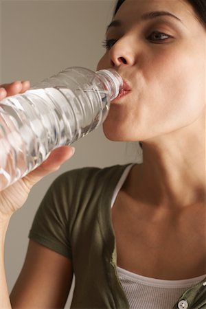 simsearch:600-00845951,k - Woman Drinking Water Foto de stock - Sin royalties Premium, Código: 600-00866786