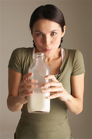 simsearch:600-00845951,k - Woman Drinking Milk Foto de stock - Sin royalties Premium, Código: 600-00866780