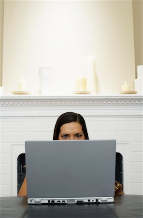 fireplace computer - Woman Using Laptop Computer Stock Photo - Premium Royalty-Free, Code: 600-00909607