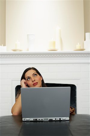 fireplace computer - Woman Using Laptop Computer Stock Photo - Premium Royalty-Free, Code: 600-00909608