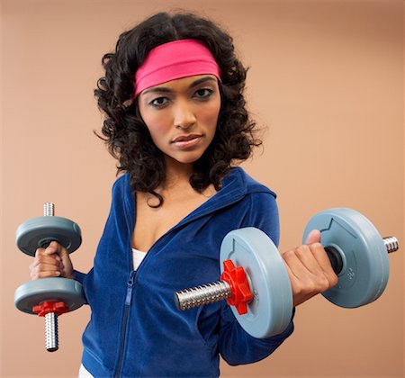 simsearch:600-00917051,k - Portrait of Woman Lifting Weights Stock Photo - Premium Royalty-Free, Code: 600-00917065