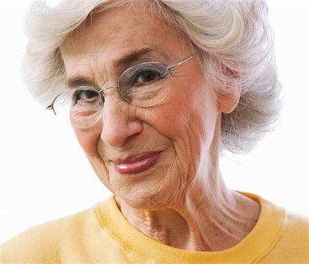 Portrait Of Old Woman On A White Background Stock Photo, Picture