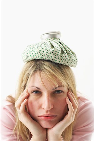 sick ice pack - Woman with Headache Stock Photo - Premium Royalty-Free, Code: 600-00917288