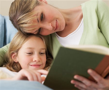 Mother and Daughter Reading Stock Photo - Premium Royalty-Free, Code: 600-00917329