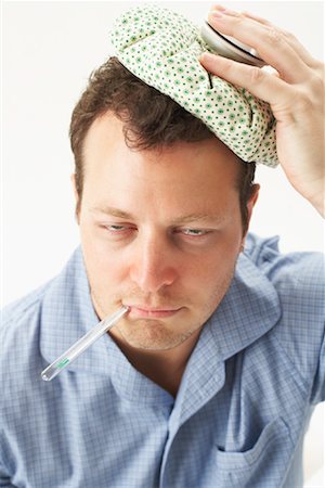 sick ice pack - Man with Headache Stock Photo - Premium Royalty-Free, Code: 600-00917322