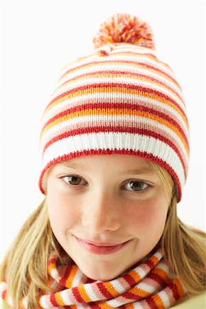 Portrait of Girl Wearing Hat Stock Photo - Premium Royalty-Free, Code: 600-00917345