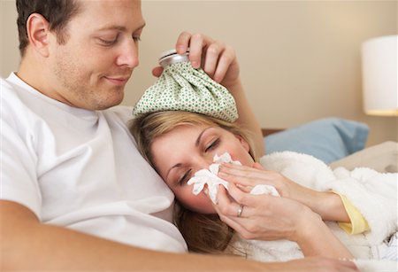 sick ice pack - Sick Woman Being Comforted Stock Photo - Premium Royalty-Free, Code: 600-00917359