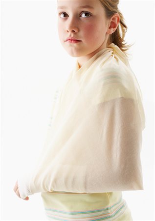 Portrait of Girl with Broken Arm Stock Photo - Premium Royalty-Free, Code: 600-00917350