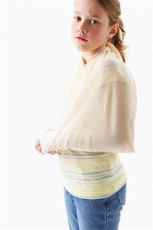 Portrait of Girl with Broken Arm Stock Photo - Premium Royalty-Free, Code: 600-00917351