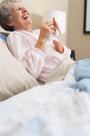 Portrait of Woman in Bed Stock Photo - Premium Royalty-Free, Code: 600-00917411