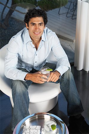 puerto rican-ecuadorian - Portrait Of A Man With A Drink Stock Photo - Premium Royalty-Free, Code: 600-00917512