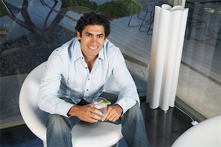 puerto rican-ecuadorian - Portrait Of A Man With A Drink Stock Photo - Premium Royalty-Free, Code: 600-00917513