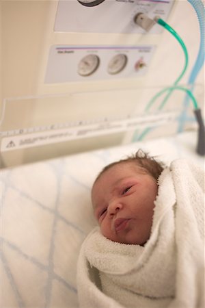 Newborn Baby in Delivery Room Stock Photo - Premium Royalty-Free, Code: 600-00911417